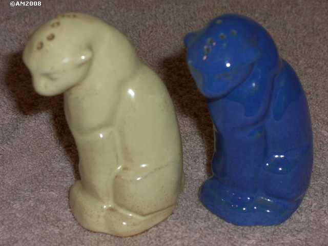 Ivory and royal blue cat shakers with cursive pour holes